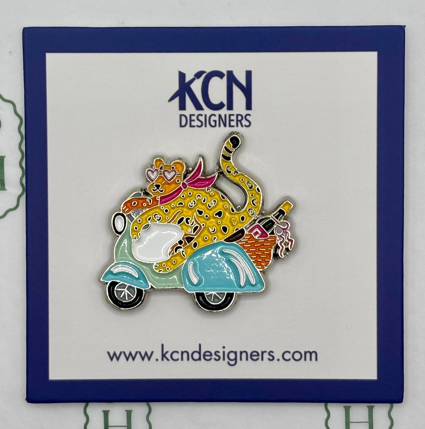 Needle minder: Leopard on Scooter